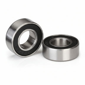Two metal bearings on a white background
